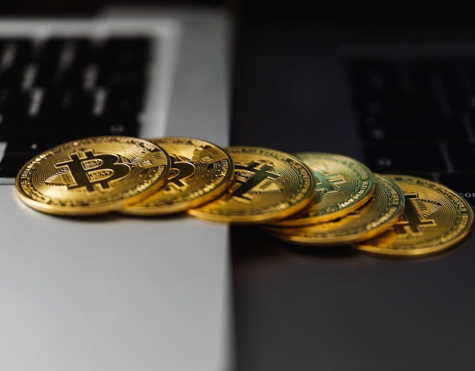 Tecnologias que estão mudando o mercado de investimentos Close-Up Shot oof Gold Round Coins